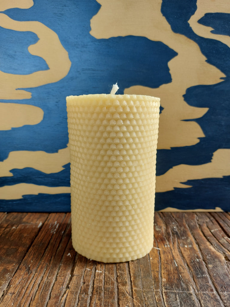 Honeycomb pattern beeswax pillars