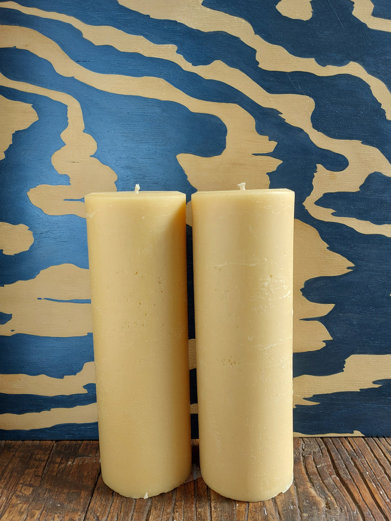 Natural yellow beeswax cylinder pillars. Raw beeswax. Alberta beeswax.